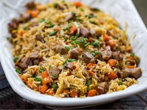 fried rice mixed with chicken, sausage and beef,